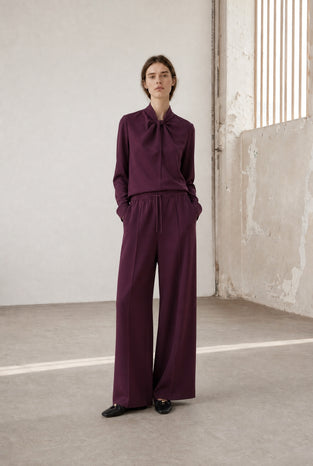 Evo wide-leg technical jersey pants | Cherry